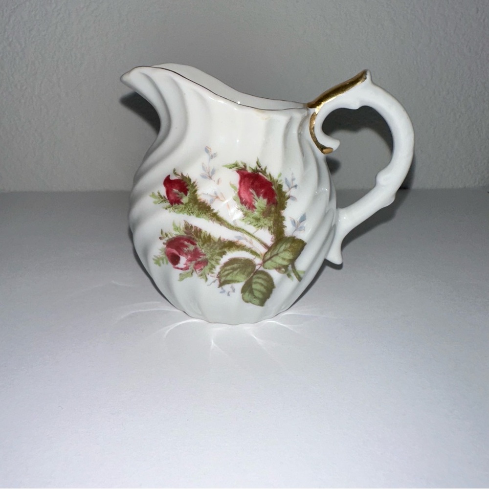 Elegant Floral Porcelain Pitcher; vintage; made in Japan; no damage; about 3”